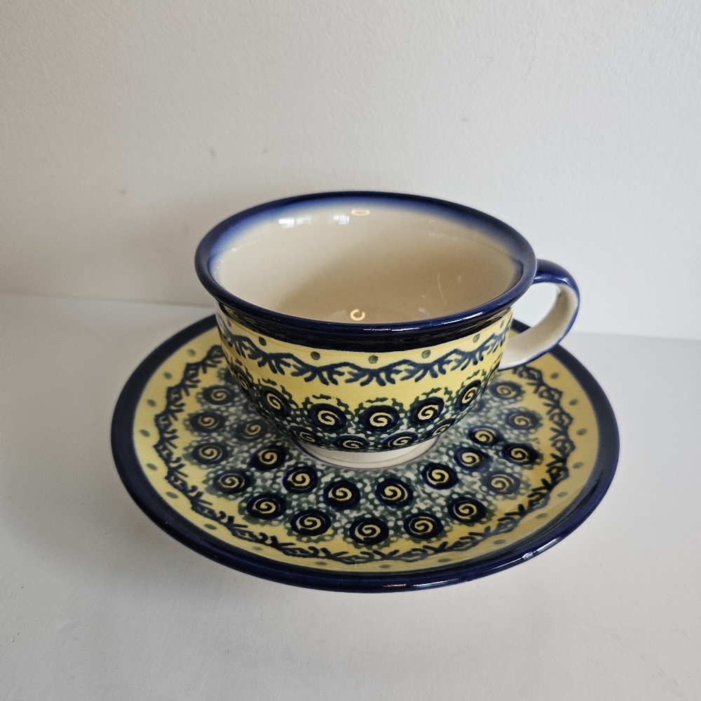 Polish Pottery cup and saucer Boleslawiec Poland bumble bee Peacock pattern